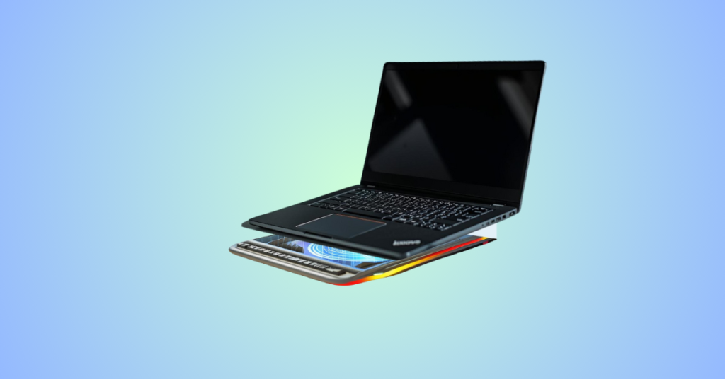 A slim laptop cooling pad placed under a laptop on a modern desk, designed for quiet cooling in a professional work environment.